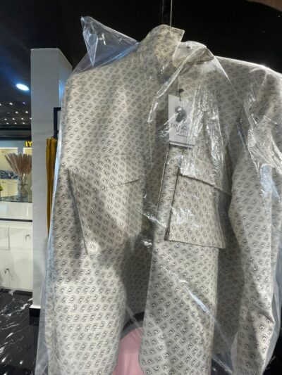 White/black dotted shirt