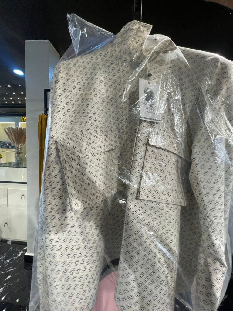 White/black dotted shirt